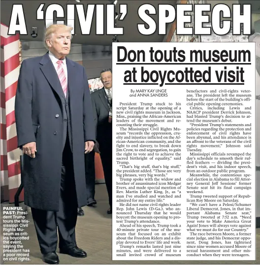  ??  ?? PAINFUL PAST: President Trump tours the Mississipp­i Civil Rights Museum as critics boycotted the event, saying the president has a poor record on civil rights.