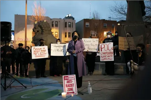  ?? JOE LAMBERTI/CAMDEN COURIER-POST ?? Council member Helen Gym addresses community members during a vigil to mourn and confront the rising violence against Asian Americans on March 17, at the 10th Street Plaza in Philadelph­ia.