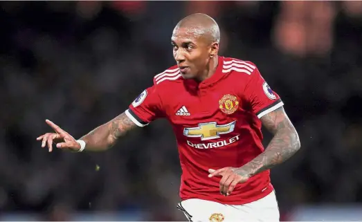  ?? — Reuters ?? Right on target: Manchester United’s Ashley Young celebrates after scoring the second goal against Watford during the English Premier League match at Vicarage Road on Tuesday.