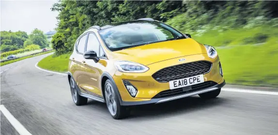  ??  ?? The new Ford Fiesta Active offers SUV-like styling and a raised ride height.