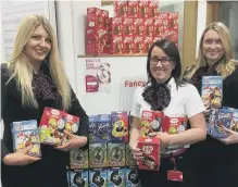  ??  ?? Kirsty Thompson, Louise Reid and Paula Hannah, from Virgin Money, in Fawcett Street, with some of the egg donations made last year.