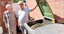 ?? ?? Peter Evans and Dr Arshad Jarral beside unemptied bins in Stafford Close. Ref:134636-2