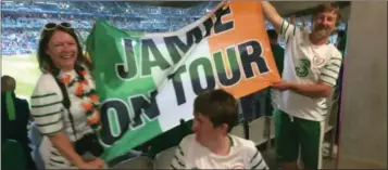  ??  ?? Jamie and family with the new flag after his original one was stolen and below, the story was big in France.