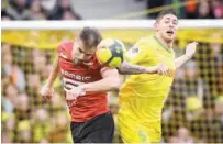  ?? Agence France-presse ?? Rennes’ Damien Da Silva (left) vies with Nantes’ Emiliano Sala during their French League match at the La Beaujoire Stadium in Nantes on Sunday.