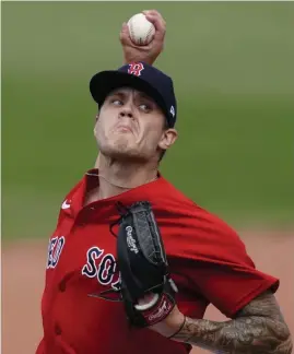  ?? AP; BeloW, aP FIle ?? LIGHT UP THE RADAR GUN: What the Red Sox got from Tanner Houck last year would go a long way toward helping the pitching staff over 162 games. Below, Nathan Eovaldi got touched up for four runs over four innings on Sunday against the Minnesota Twins, but he did touch 100 mph on a number of occasions.