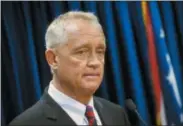  ?? JOHN MINCHILLO — THE ASSOCIATED PRESS FILE ?? Hamilton County Prosecutor Joe Deters speaks during a news conference in Cincinnati. Deters has decided against charging the driver of a pickup truck that struck a police officer who died.