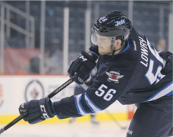  ?? — POSTMEDIA NEWS FILES ?? Winnipeg Jets centre Adam Lowry is on pace for the most productive goal-scoring season of his NHL career.