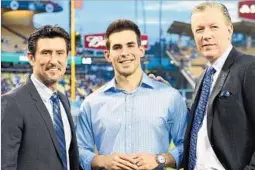  ?? Jayne Kamin-Oncea Getty Images ?? JOE DAVIS, center, is Dodgers’ new TV play-by-play man, replacing beloved Vin Scully. Nomar Garciaparr­a, left, Orel Hershiser will join him in booth.