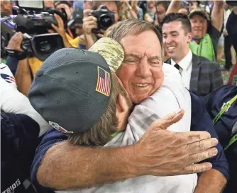  ?? MATTHEW EMMONS, USA TODAY SPORTS ?? Patriots coach Bill Belichick, right, celebrates after winning his fifth Super Bowl last month.