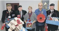  ?? RICHARD PONTER ?? The launch of the Poppy Appeal in the Balmoral Centre. From left, Ian Temple, Pete Parkinson, Sheila Miller, Alan Lee and Robert Owens.