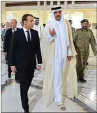  ??  ?? Emmanuel Macron et l’émir du Qatar, Tamim ben Hamad Al Thani.