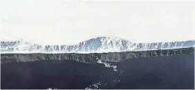  ?? NATHAN KURTZ/NASA ?? The iceberg that sheared off an Antarctic ice shelf hasn’t moved much — about 15 miles at its southern edge — since it broke free in July.