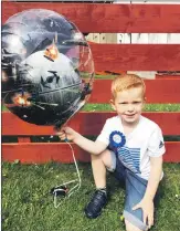  ??  ?? Robbie Borthwick from Campbeltow­n turned five on Thursday July 2. He celebrated his birthday by playing with all his new Lego sets. His mummy, daddy and brother Shaun send him lots of love.