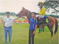  ??  ?? SUPER ONE with owners and jockey after winning last year's New Year Cup.