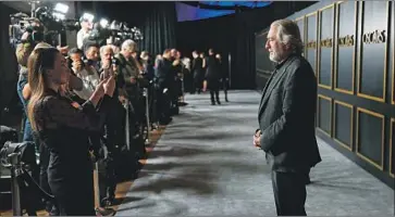  ?? Al Seib Los Angeles Times ?? ROBERT DE NIRO stops by the luncheon, where nominees get to know each other before the Oscars Feb. 9.