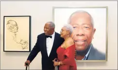  ?? Katherine Frey / The Washington Post ?? Hank Aaron with his wife, Billye, in front of his picture at the National Portrait Gallery in Washington in 2015.