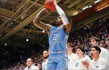  ?? Jared C. Tilton / Getty Images ?? Caleb Love of North Carolina had 20 points for the Tar Heels in their win over Duke on Saturday. He was one of four North Carolina players to score at least 20 points in the win.