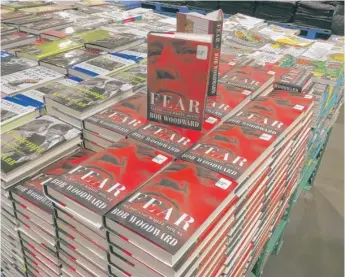  ?? PABLO MARTINEZ MONSIVAIS/AP ?? Copies of “Fear” are seen for sale at Costco on Tuesday in Arlington, Virginia.