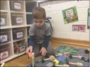  ?? ZACHARY SRNIS — THE MORNING JOURNAL ?? Jacob Velez, 3, of Lorain, plays with blocks during the Horizon preschool ribbon cutting. Velez is one of four students who have enrolled in the new preschool at 1110 W. Fourth St. in Lorain.