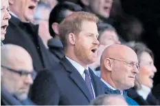  ??  ?? Prince Harry belts out the National Anthem at Twickenham