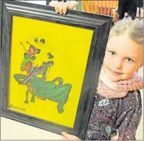  ?? STEVE SHARRATT/THE GUARDIAN ?? Seven-year-old Delilah Jamieson with her art show exhibit featuring a grasshoppe­r playing a fiddle.