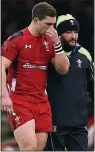  ??  ?? HEAD: Wales winger was assessed for concussion