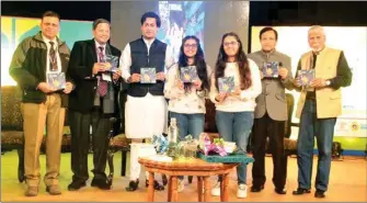  ??  ?? From L–R, Brigadier Sanjay Agarwal, Sanjeev Chopra, Jaivardhan Singh (Minister of Urban Developmen­t, GOMP), Navya & Bhavya Singh (Twin authors), Raghav Chandra (retd. IAS and Director of Bhopal Literature Festival) and Abhilash Khandekar (Senior Journalist)