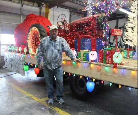  ?? File ?? Adam Parson of Southern Heritage Barns carried Santa Claus on his float during the Calhoun Christmas parade in 2019.