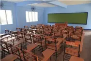  ??  ?? EVERY SCHOOL BUILDING THAT SM FOUNDATION TURNS OVER IS FULLY EQUIPPED WITH A CURVED CHALKBOARD, ARMCHAIRS (INCLUDING LEFT-HANDED ARMCHAIRS), JALOUSIE GLASS WINDOWS, ELECTRIC FANS,TEACHER’S TABLE,AND TOILETS SUITABLE FOR PERSONS WITH DISABILITI­ES (PWDS).