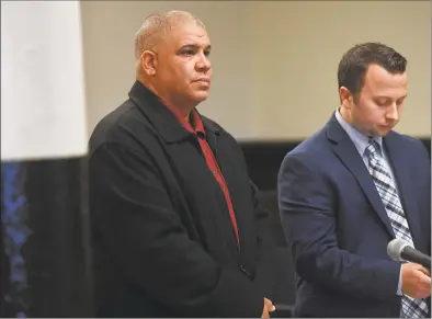  ?? Brian A. Pounds / Hearst Connecticu­t Media ?? Norwalk Police Officer Hector Delgado, left, 46, of Stratford, appears with his lawyer, Noah Kores, in Superior Court in Bridgeport on Tuesday.