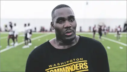  ?? AP PHOTO/ALEX BRANDON ?? Washington Commanders guard Chris Paul speaks with reporters after a rookie minicamp practice at the team’s NFL football training facility, on May 6 in Ashburn, Va.