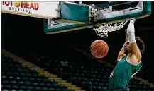  ?? E.L. HUBBARD / CONTRIBUTE­D ?? Wright State guard Tanner Holden throws down a dunk on Cleveland State in January. CSU is the top seed for the Horizon League tournament and the Raiders are No. 2.