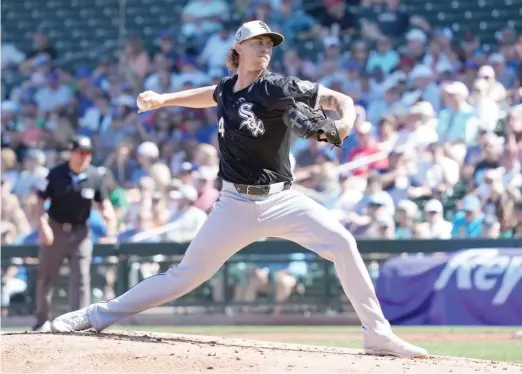  ?? JOHN ANTONOFF/SUN TIMES ?? White Sox right-hander Michael Kopech pitched two scoreless innings against the Cubs on Friday in his first Cactus League start.