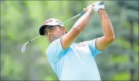  ?? AFP ?? Anirban Lahiri plays a shot during the first round of the WGC in Akron, Ohio on Thursday.