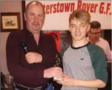  ??  ?? Colm Murphy receives the Minor Player of the Year award from Pat Ward.