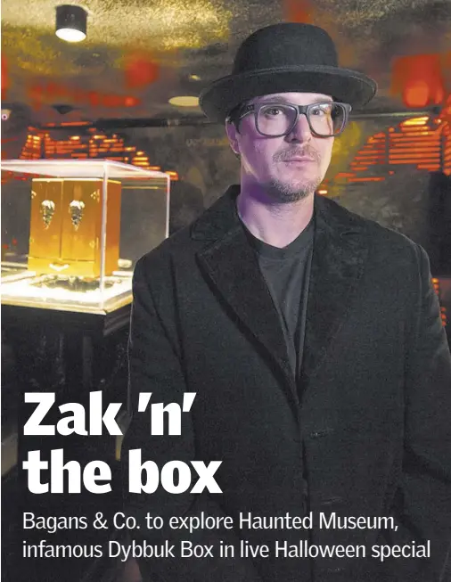  ?? Richard Brian Las Vegas Review-Journal @vegasphoto­graph ?? Zak Bagans with the Dybbuk Box, a wine cabinet that will have a starring role in a live Travel Channel special.