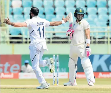 ?? Picture: ISURU SAMEERA PERIS/GALLO IMAGES ?? ANOTHER ONE GONE: India’s Mohammed Shami celebrates the wicket of SA captain Faf du Plessis during day five of the first Test at the Dr YS Rajasekhar­a Reddy Cricket Stadium in Visakhapat­nam