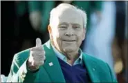 ?? CHARLIE RIEDEL — THE ASSOCIATED PRESS FILE ?? In this file photo, Arnold Palmer gives a thumbs up before the ceremonial first tee before the first round of the Masters golf tournament, in Augusta, Ga. The King turned up one last time at the Masters, in ill health but still flashing that familiar...