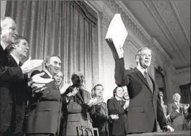  ?? Associated Press ?? PRESIDENT CARTER after signing the Alaska National Interest Lands Conservati­on Act in 1980, which created 162,500 square miles of national park land.