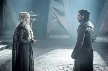  ?? THE ASSOCIATED PRESS ?? Emilia Clarke as Daenerys Targaryen is seen with Kit Harington as Jon Snow in a scene from Game of Thrones.