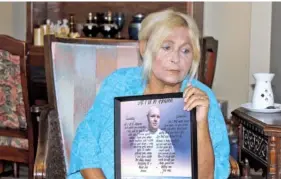  ?? BRETT KELMAN/KFF HEALTH NEWS ?? Penny Meade holds a photo of her son, Jeremiah Shane Fields, who died at a Ballad Health hospital in 2019. The Centers for Medicaid & Medicare Services investigat­ed the death and found Fields’ care was not up to standard.
