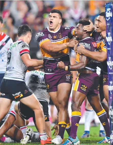  ?? Picture: AAP IMAGE ?? James Segeyaro (second from right) was the star last night with his late try helping the Broncos to a gritty win.