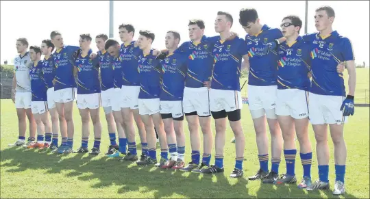  ??  ?? The Wicklow Minor footballer­s stand for the national anthem ahead of their MFC clash with Meath.