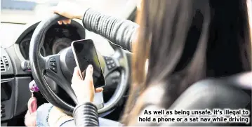  ?? ?? As well as being unsafe, it’s illegal to hold a phone or a sat nav while driving