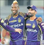  ?? AFP ?? Knight Riders captain Dinesh Karthik (right) has shown the way by emerging the highest scorer with 412 runs.