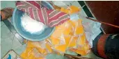  ??  ?? Packets of spurious ghee seized by the Malkajgiri Special operations Team on Saturday night.