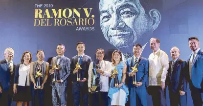  ??  ?? Winners of RVR Award for Nation Building and Siklab Awards together with the board of judges for the first Siklab Awards. (From left) PHINMA Corp. president and CEO Ramon del Rosario Jr. and VP and director of strategy Danielle del Rosario, Teach for the Philippine­s co-founder and CEO Clarissa Isabelle Delgado, Beengo Farms founder Gary Ayuste, iVolunteer Philippine­s executive director and 2019 Grand Siklab awardee Jan Bernard Tan, CARD MRI founder and managing director Dr. Jaime Aristotle Alip, Earth Kitchen and Got Heart Foundation founder and executive director Melissa Yap; Project Scholar, Project ADAMMS and Cooltura Couture founder Edgar Elago; La Fruiteria Inc. chairman and CEO Senen Bacani, PHINMA Corp. SEVP and COO Robert Lavina and JCI Manila president Luis Angelo Sevilla.