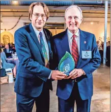  ?? CONTRIBUTE­D PHOTO ?? CRBI advocacy and communicat­ion coordinato­r Joe Cook presents a Clean 13 award to Rep. John Meadows at the Georgia Water Coalition's Clean 13 Celebratio­n held March 8 at Mason Fine Arts Center in Atlanta.