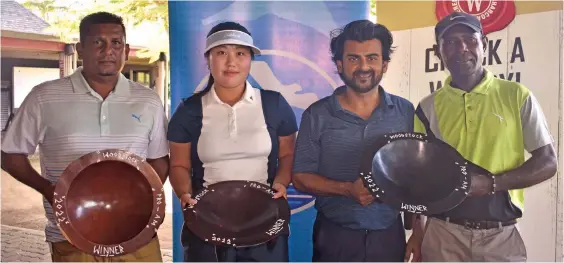  ?? Photo: Waisea Nasokia ?? From left; Amateur winner Abid Hussein, Ladies winner Bella Cho, Tappoo’s managing director Kaushal Tappoo and profession­al winner Anasa Seruvatu wih their spoils at the 2022 Woodstock Pro- Am at the Denarau Golf and Racquet Club on May 7, 2022.