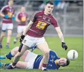  ??  ?? Westmeath's Jack Quinn and Wicklow's Eoin Murtagh tangle in Aughrim.